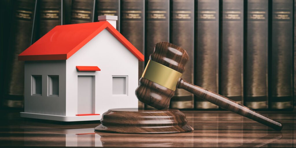 wooden auction or judge gavel, a small house and books. 3d illustration wooden auction or judge gavel, a small house and books. 3d illustration